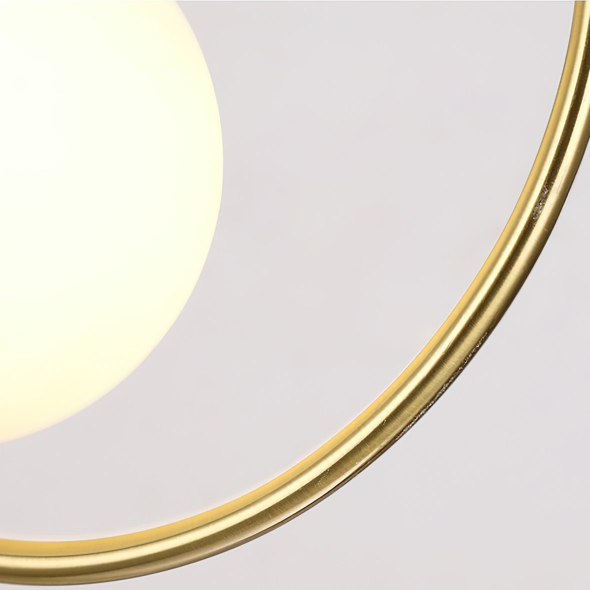 modern-nordic-glass-ball-pendant-light-with-elegant-gold-hoop-for-indoor-decor