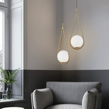 modern-nordic-glass-ball-pendant-light-with-elegant-gold-hoop-for-indoor-decor