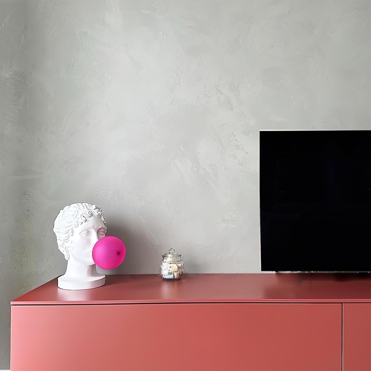 Modern Grace Portable Table Lamp with Pink Glass Globe and White Resin Bust Sculptural Base