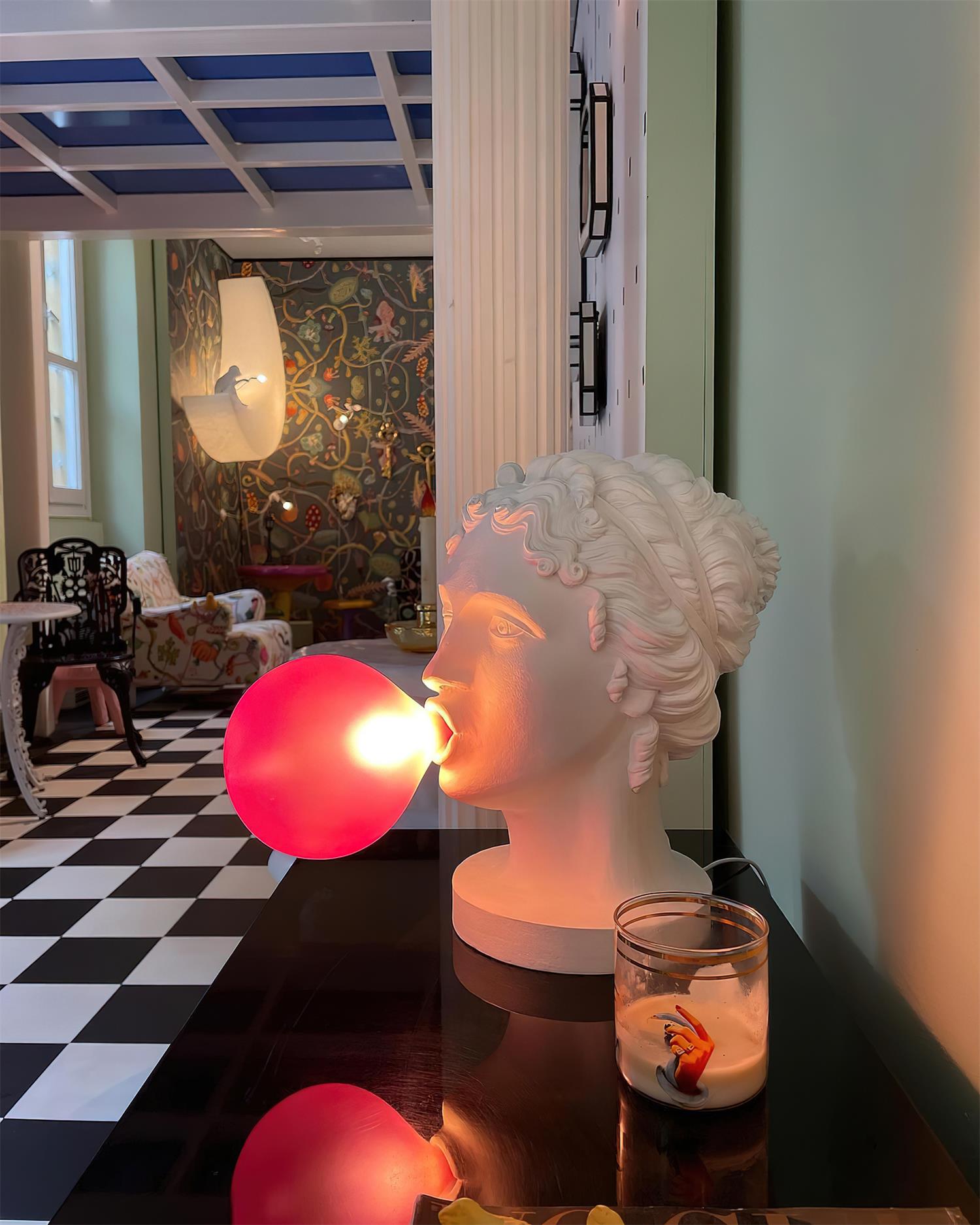 Modern Grace Portable Table Lamp with Pink Glass Globe and White Resin Bust Sculptural Base