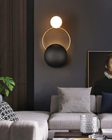 modern-geometric-circle-design-wall-sconce-gold-and-black-indoor-accent-lighting
