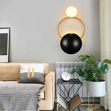 modern-geometric-circle-design-wall-sconce-gold-and-black-indoor-accent-lighting