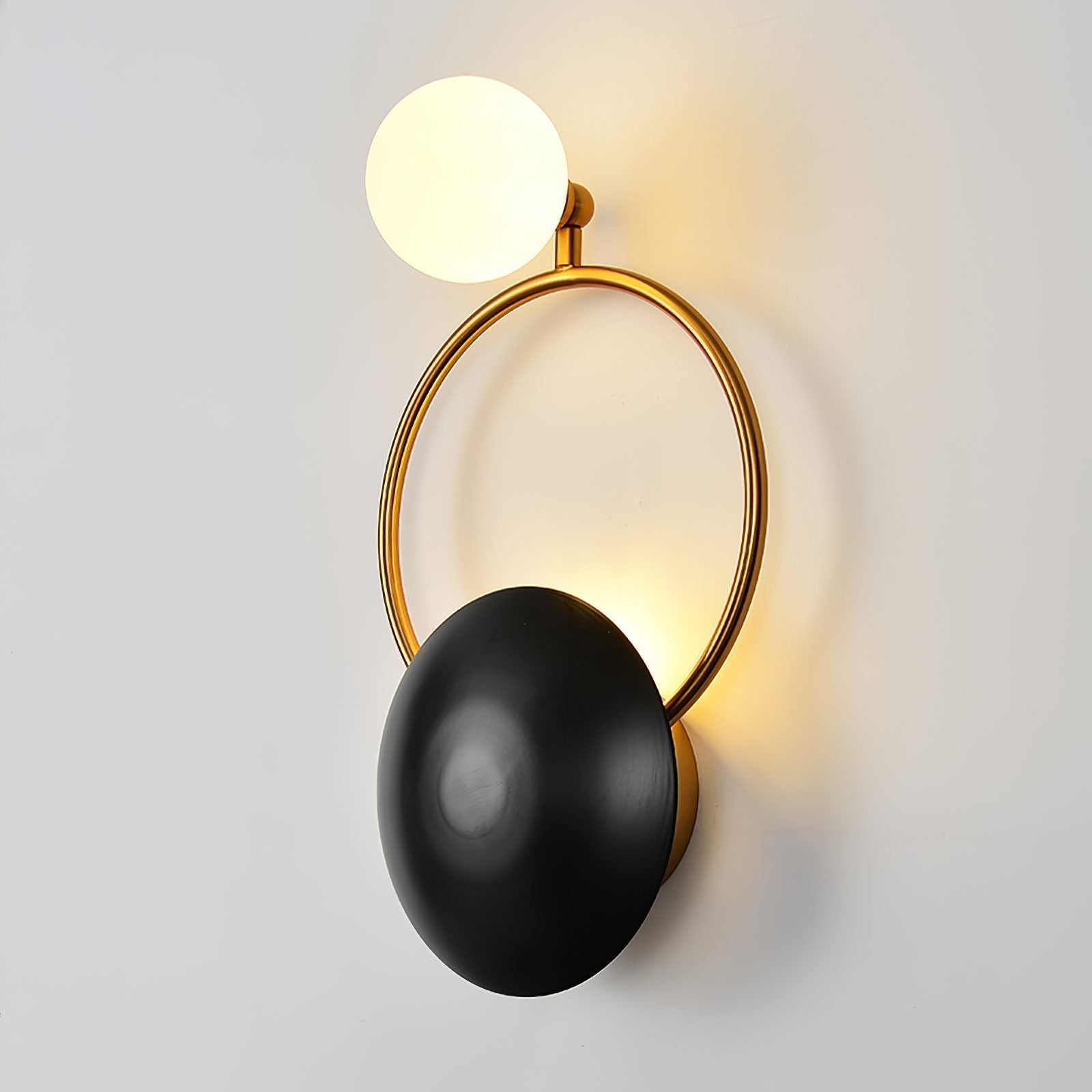 modern-geometric-circle-design-wall-sconce-gold-and-black-indoor-accent-lighting