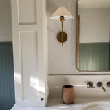 modern-brass-wall-sconce-with-triangular-fabric-shade-hackney-style-light