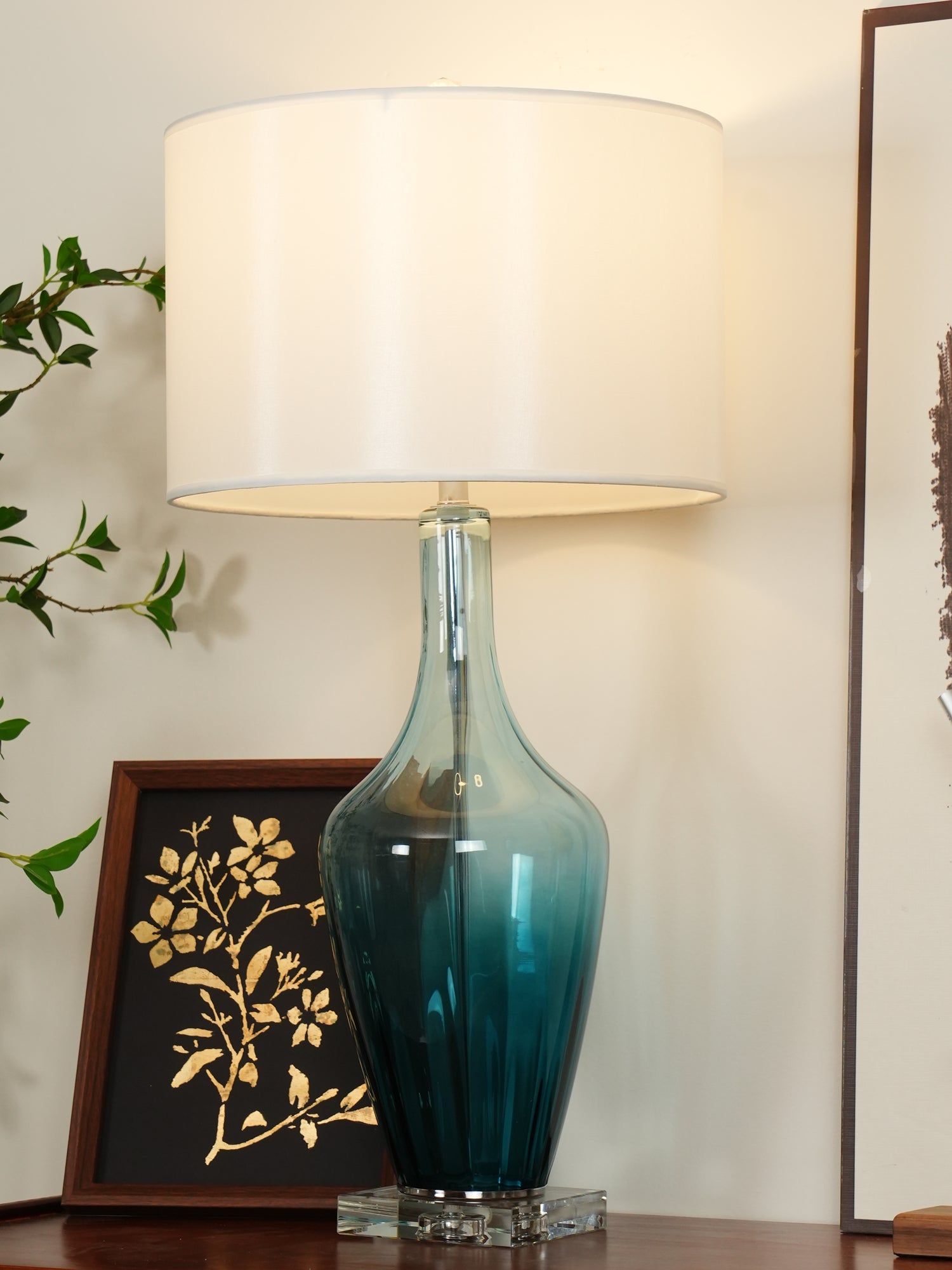 Modern Azure Blue Glass Table Lamp with Crystal Accents and Beige Linen Drum Shade