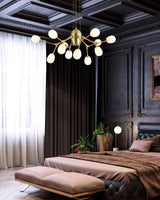 modern-brass-chandelier-with-pearl-glass-shades-and-elegant-curved-arms