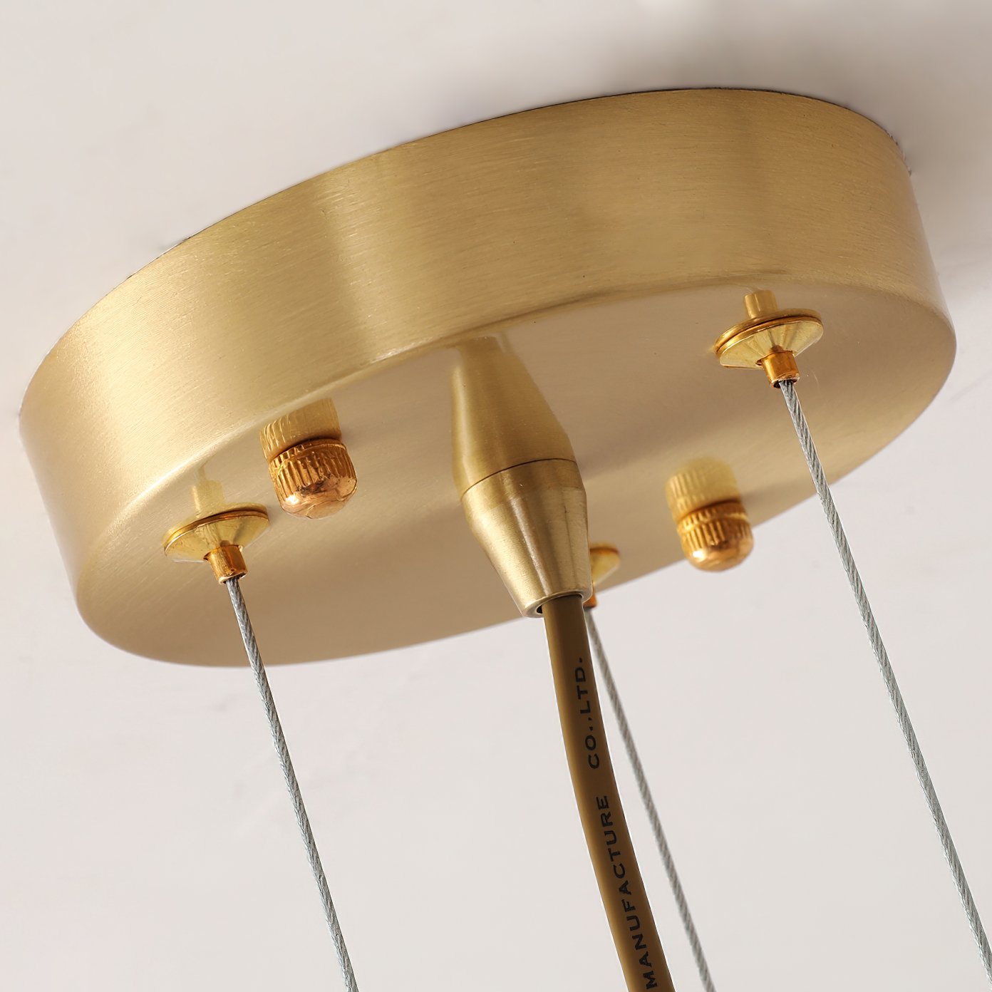 modern-brass-chandelier-with-pearl-glass-shades-and-elegant-curved-arms