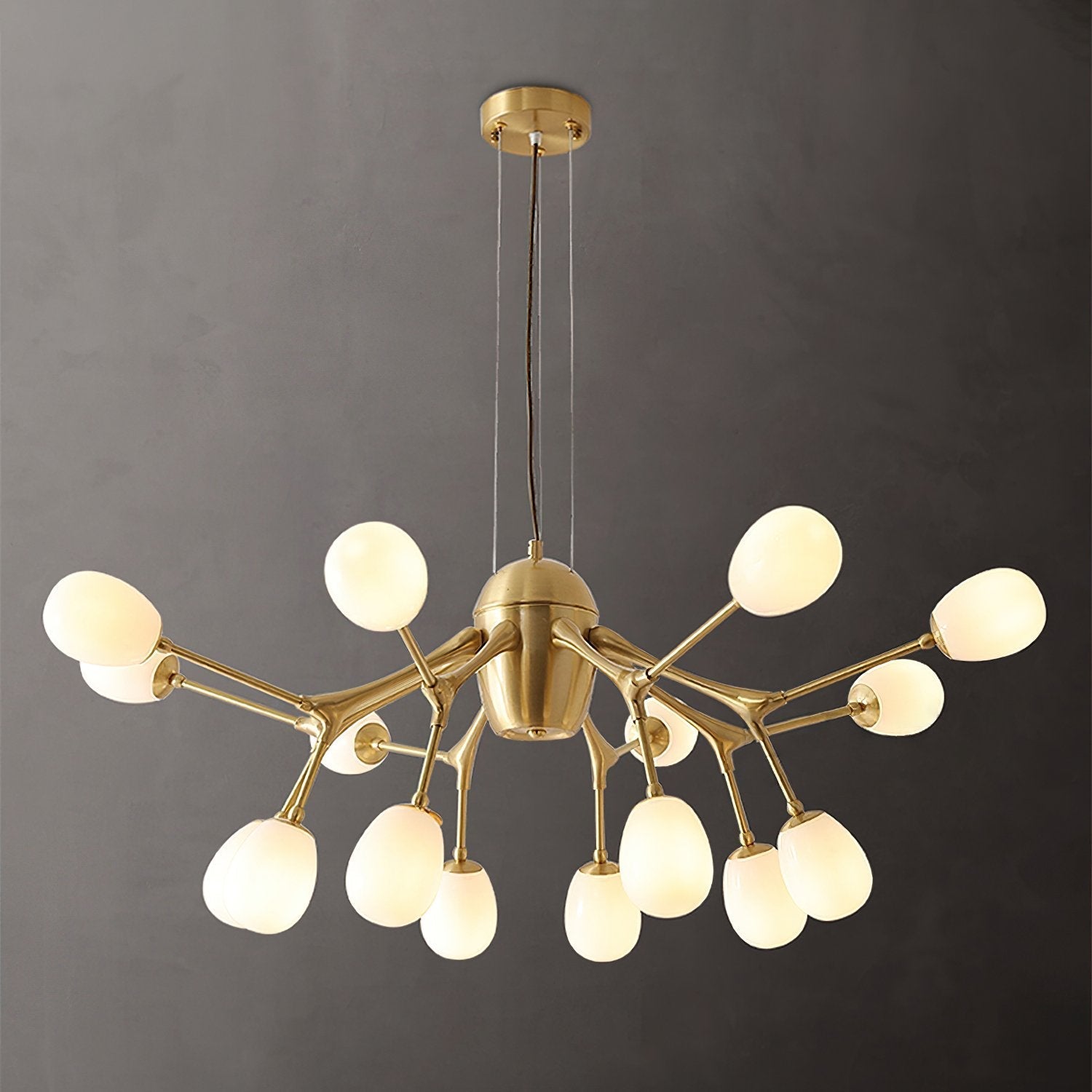 modern-brass-chandelier-with-pearl-glass-shades-and-elegant-curved-arms