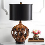 modern-ceramic-table-lamp-with-hollow-design-and-fabric-drum-shade-for-elegant-interior-lighting-decor