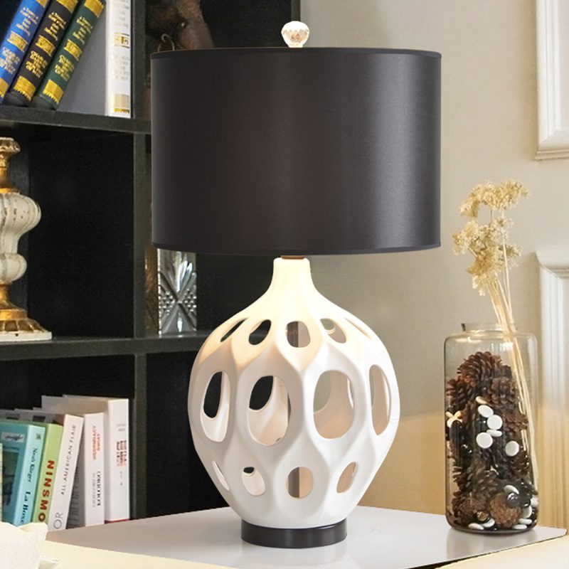 modern-ceramic-table-lamp-with-hollow-design-and-fabric-drum-shade-for-elegant-interior-lighting-decor