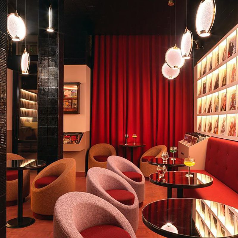 modern-circular-glass-pendant-light-with-brass-finish-and-integrated-led-spotlight