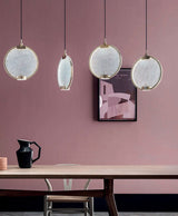 modern-circular-glass-pendant-light-with-brass-finish-and-integrated-led-spotlight