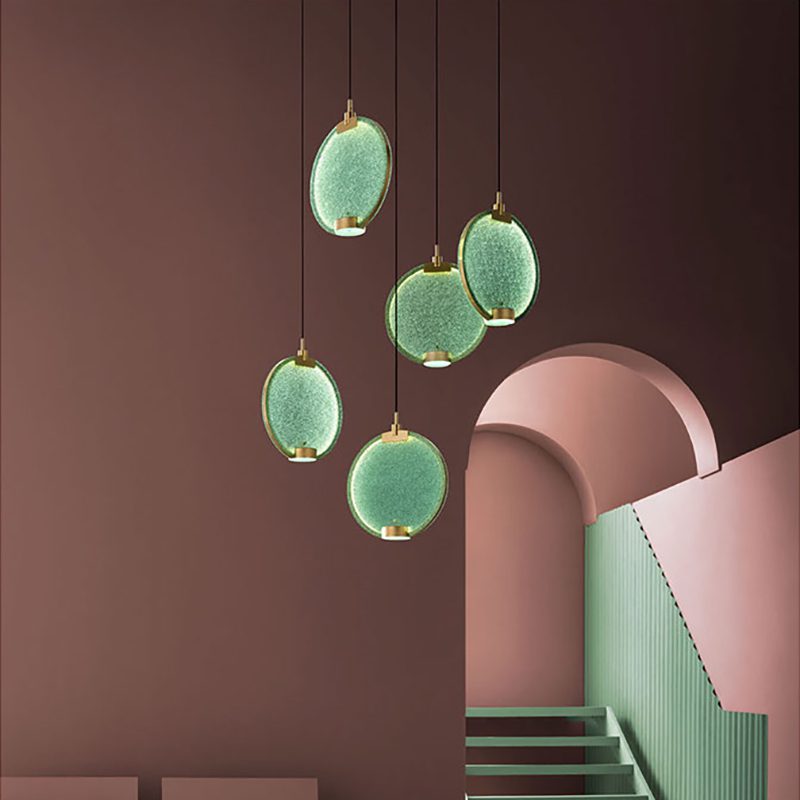 modern-circular-glass-pendant-light-with-brass-finish-and-integrated-led-spotlight