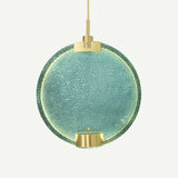 modern-circular-glass-pendant-light-with-brass-finish-and-integrated-led-spotlight