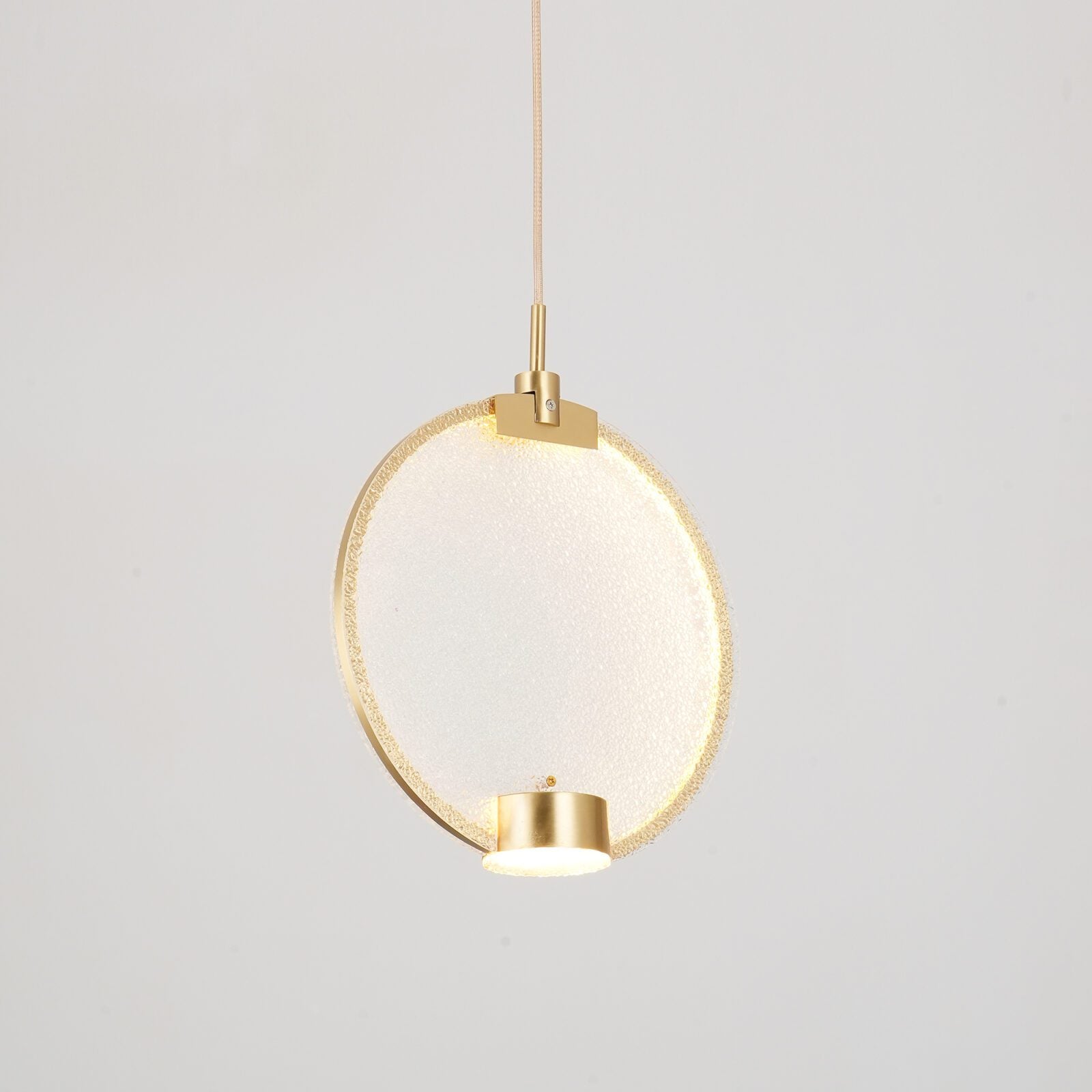 modern-circular-glass-pendant-light-with-brass-finish-and-integrated-led-spotlight