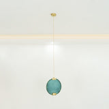 modern-circular-glass-pendant-light-with-brass-finish-and-integrated-led-spotlight