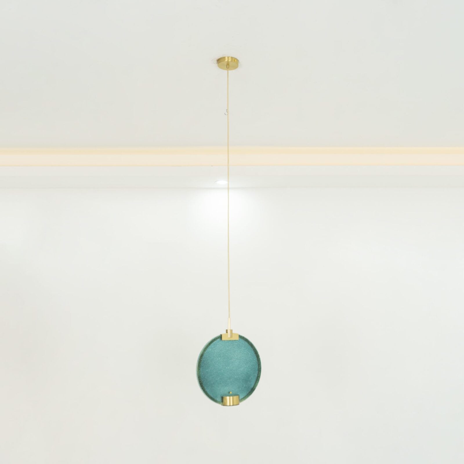 modern-circular-glass-pendant-light-with-brass-finish-and-integrated-led-spotlight