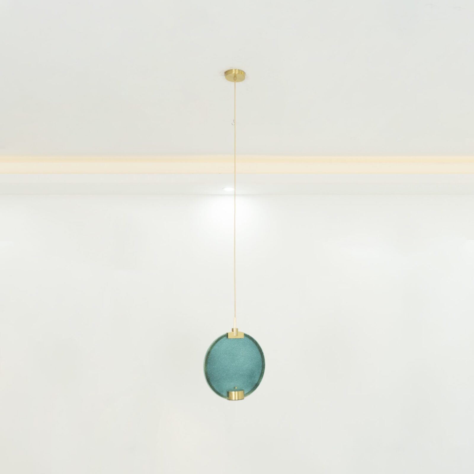 modern-circular-glass-pendant-light-with-brass-finish-and-integrated-led-spotlight
