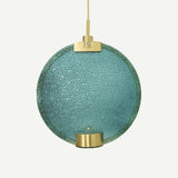 modern-circular-glass-pendant-light-with-brass-finish-and-integrated-led-spotlight