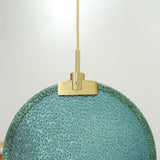 modern-circular-glass-pendant-light-with-brass-finish-and-integrated-led-spotlight