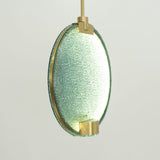 modern-circular-glass-pendant-light-with-brass-finish-and-integrated-led-spotlight