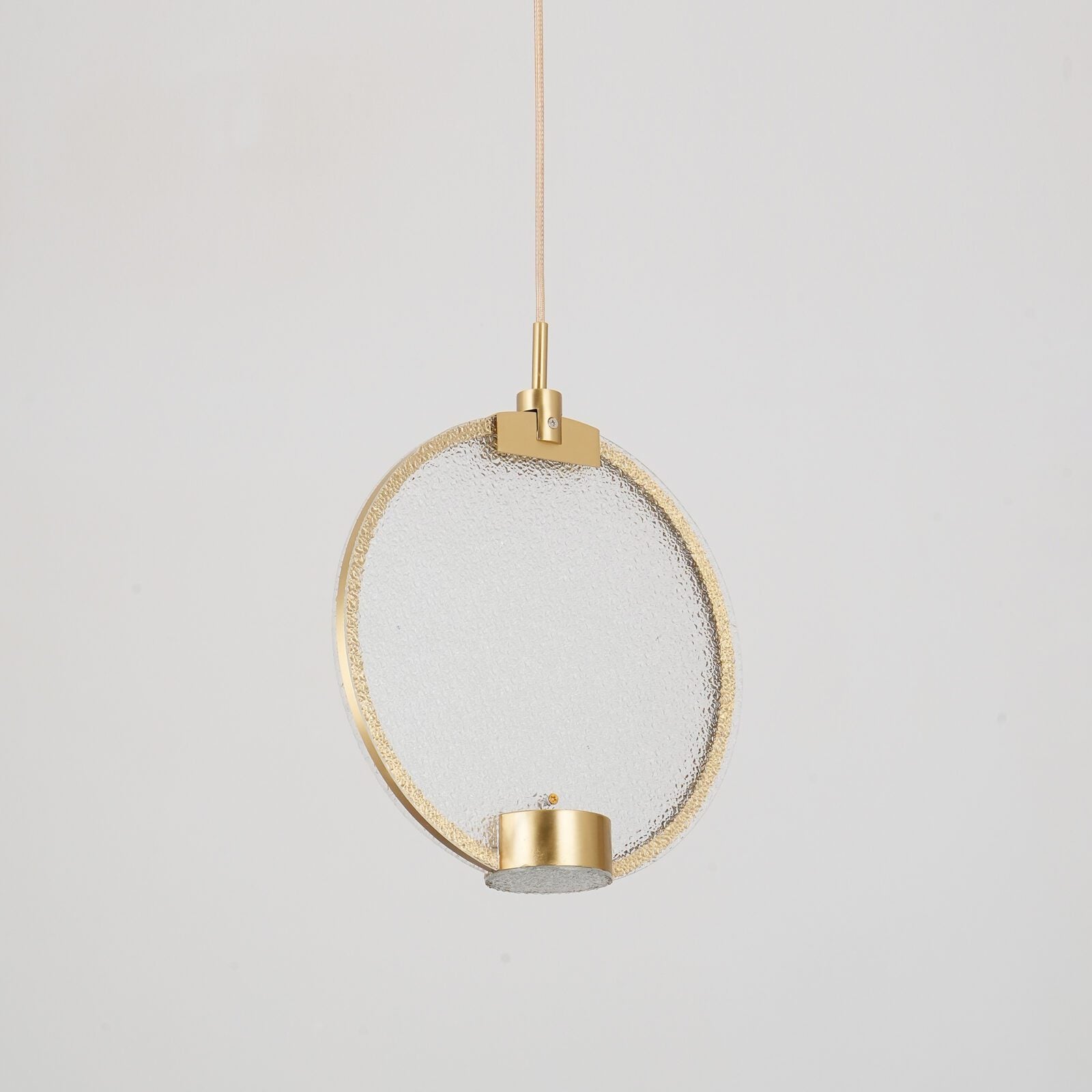 modern-circular-glass-pendant-light-with-brass-finish-and-integrated-led-spotlight