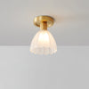 elegant-hubble-style-white-glass-ceiling-light-with-modern-brass-base
