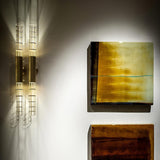 modern-gold-brass-hollow-tube-wall-sconce-hubble-vertical-indoor-lighting-fixture