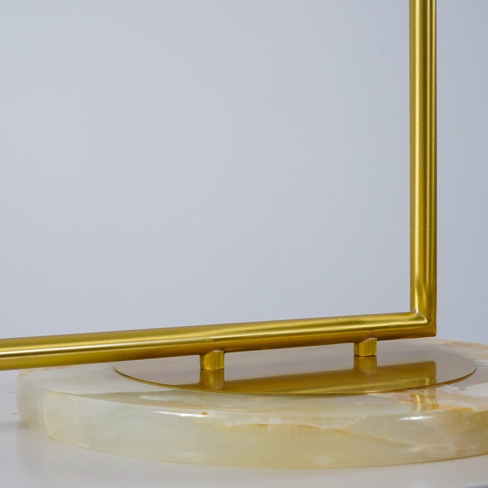 modern-industrial-gold-standing-lamp-with-white-glass-globe-shade-and-foot-switch