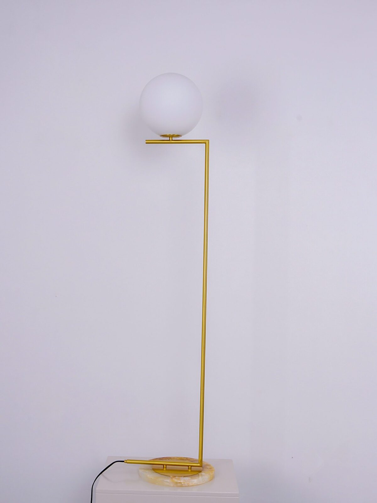 modern-industrial-gold-standing-lamp-with-white-glass-globe-shade-and-foot-switch