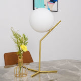 modern-opalescent-blown-glass-globe-table-lamp-with-flexible-steel-base-and-gold-finish