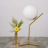modern-opalescent-blown-glass-globe-table-lamp-with-flexible-steel-base-and-gold-finish