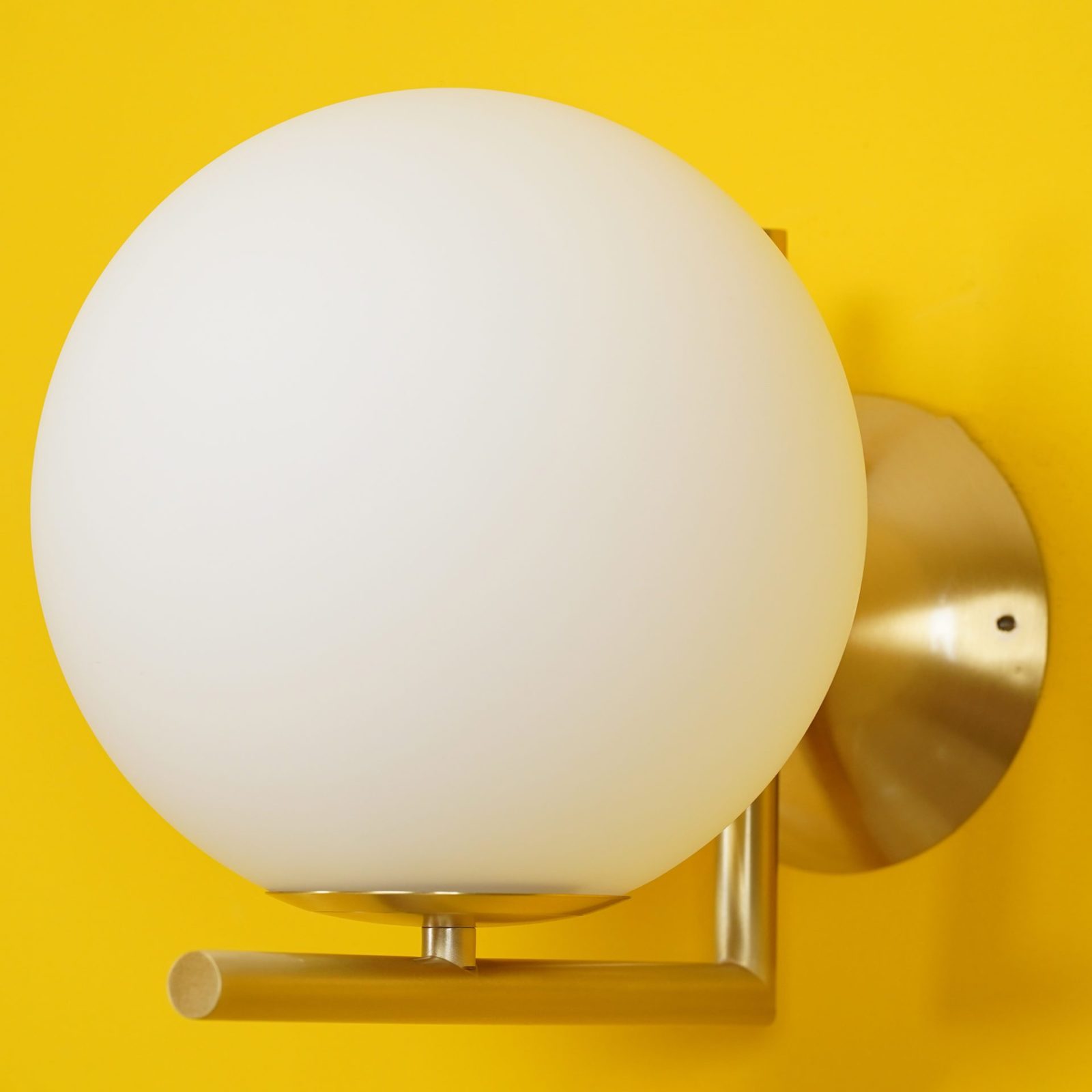 modern-opal-blown-glass-wall-sconce-with-elegant-brass-finish-round-globe-lighting
