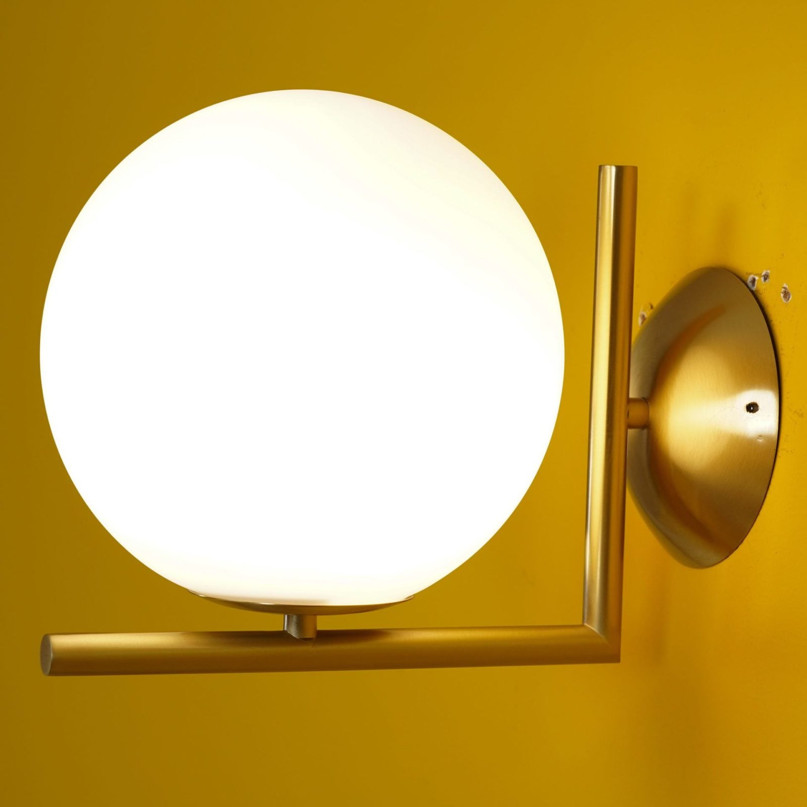 modern-opal-blown-glass-wall-sconce-with-elegant-brass-finish-round-globe-lighting