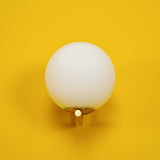 modern-opal-blown-glass-wall-sconce-with-elegant-brass-finish-round-globe-lighting