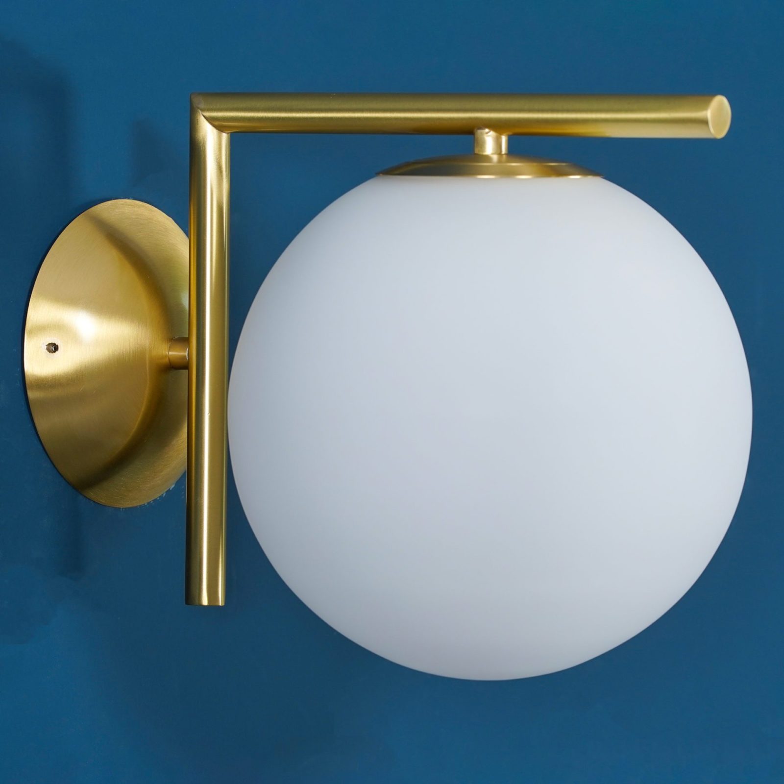 modern-opal-blown-glass-wall-sconce-with-elegant-brass-finish-round-globe-lighting