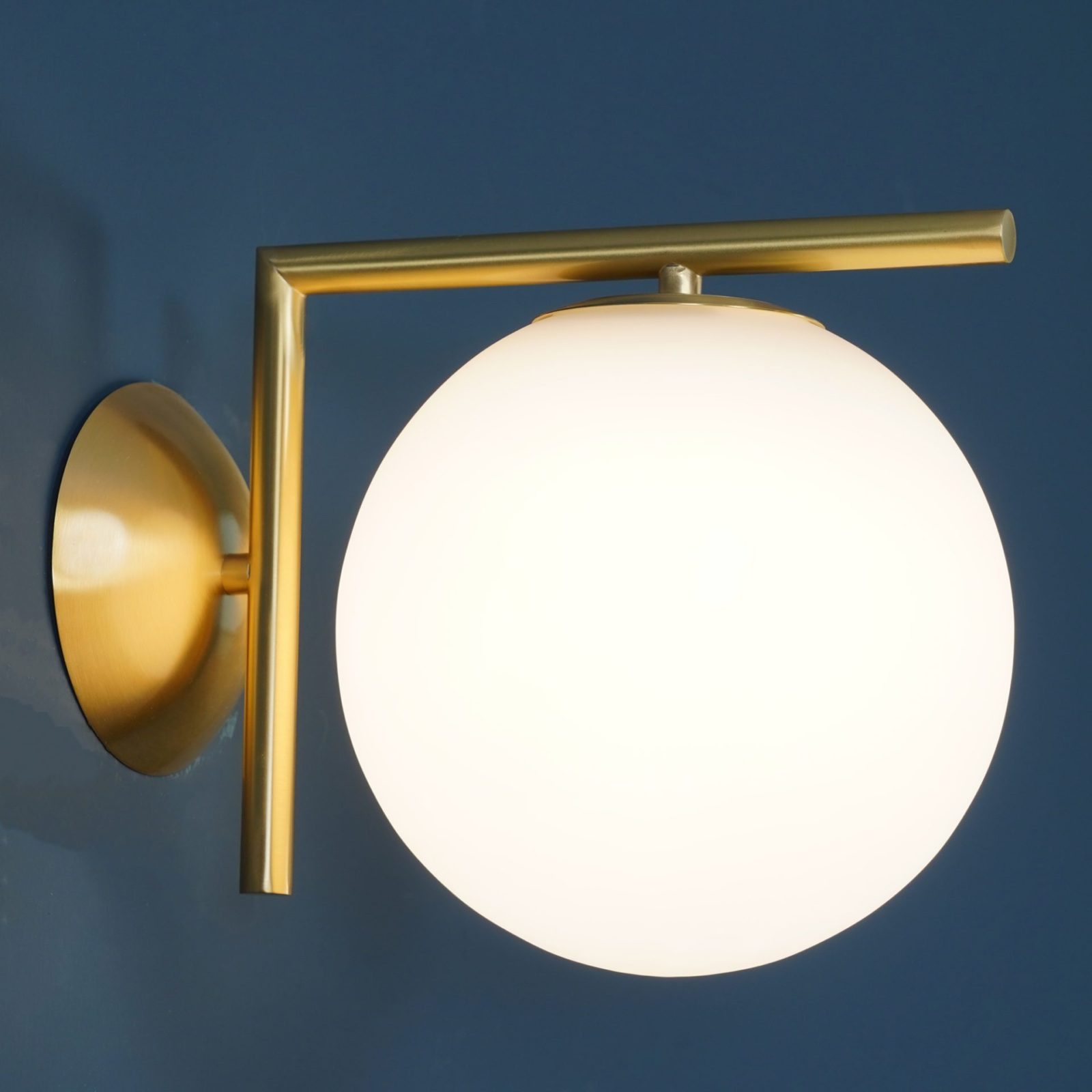 modern-opal-blown-glass-wall-sconce-with-elegant-brass-finish-round-globe-lighting
