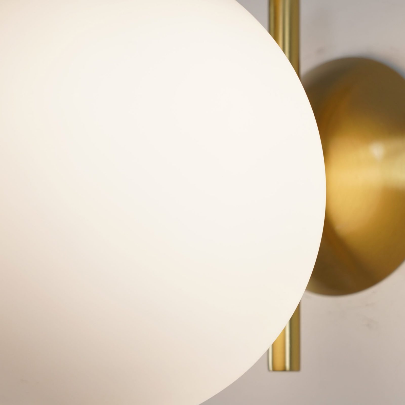 modern-opal-blown-glass-wall-sconce-with-elegant-brass-finish-round-globe-lighting