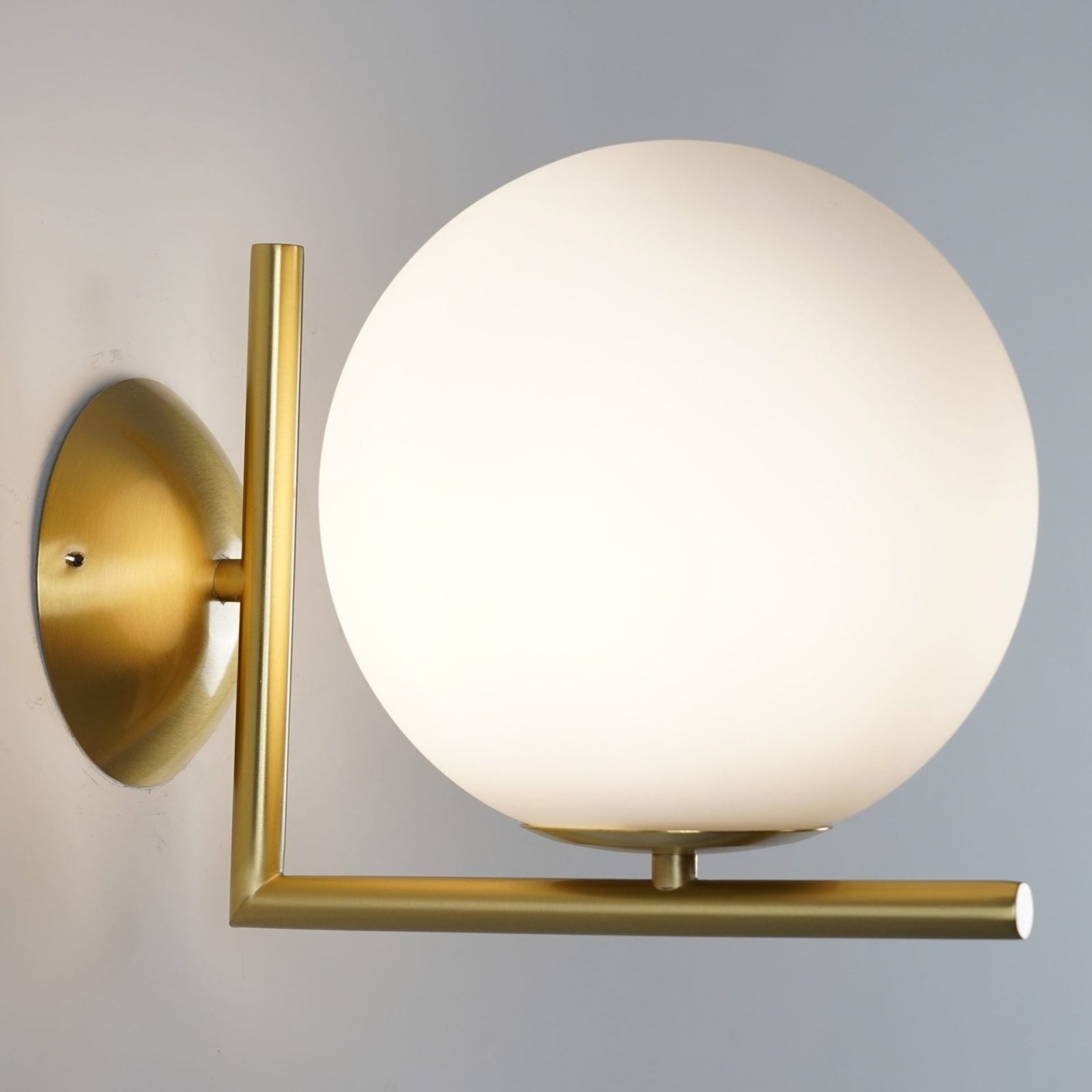 modern-opal-blown-glass-wall-sconce-with-elegant-brass-finish-round-globe-lighting