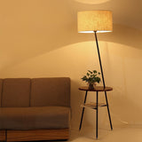 modern-inclined-wood-floor-lamp-with-fabric-shade-and-integrated-side-table