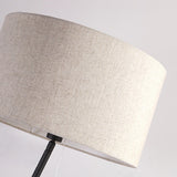modern-inclined-wood-floor-lamp-with-fabric-shade-and-integrated-side-table