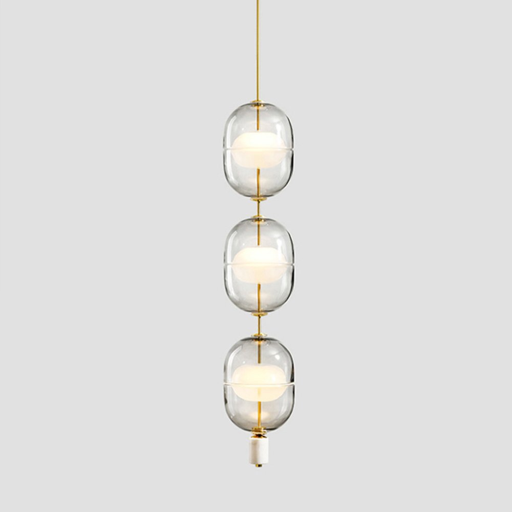 inder-nordic-glass-capsule-pendant-light-with-white-marble-and-metal-accents