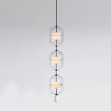 inder-nordic-glass-capsule-pendant-light-with-white-marble-and-metal-accents
