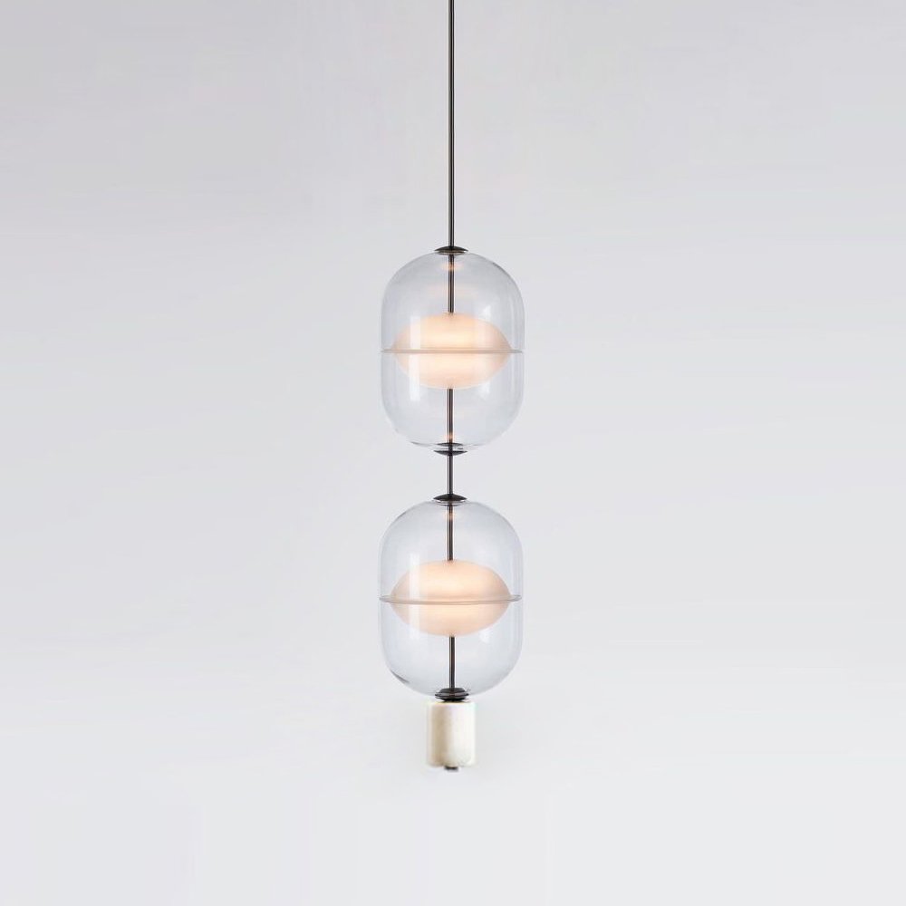inder-nordic-glass-capsule-pendant-light-with-white-marble-and-metal-accents