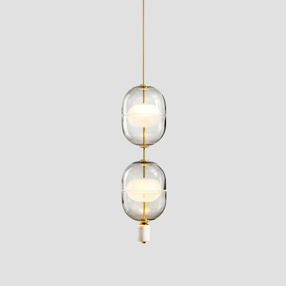 inder-nordic-glass-capsule-pendant-light-with-white-marble-and-metal-accents
