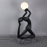modern-artistic-human-figure-floor-lamp-with-luminous-glass-globe-sphere