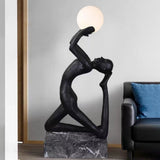 modern-artistic-human-figure-floor-lamp-with-luminous-glass-globe-sphere