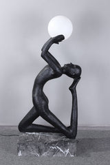 modern-artistic-human-figure-floor-lamp-with-luminous-glass-globe-sphere