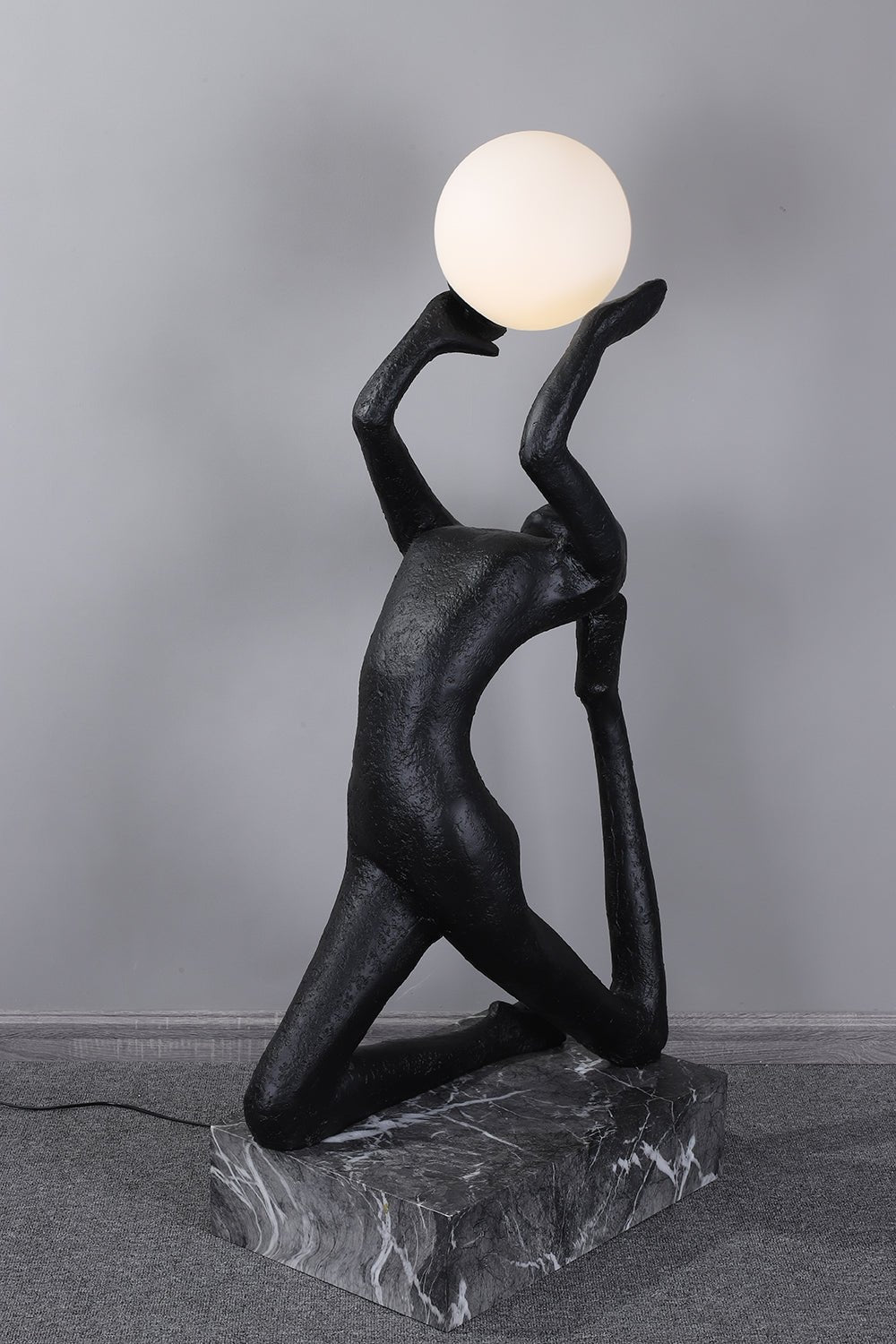 modern-artistic-human-figure-floor-lamp-with-luminous-glass-globe-sphere