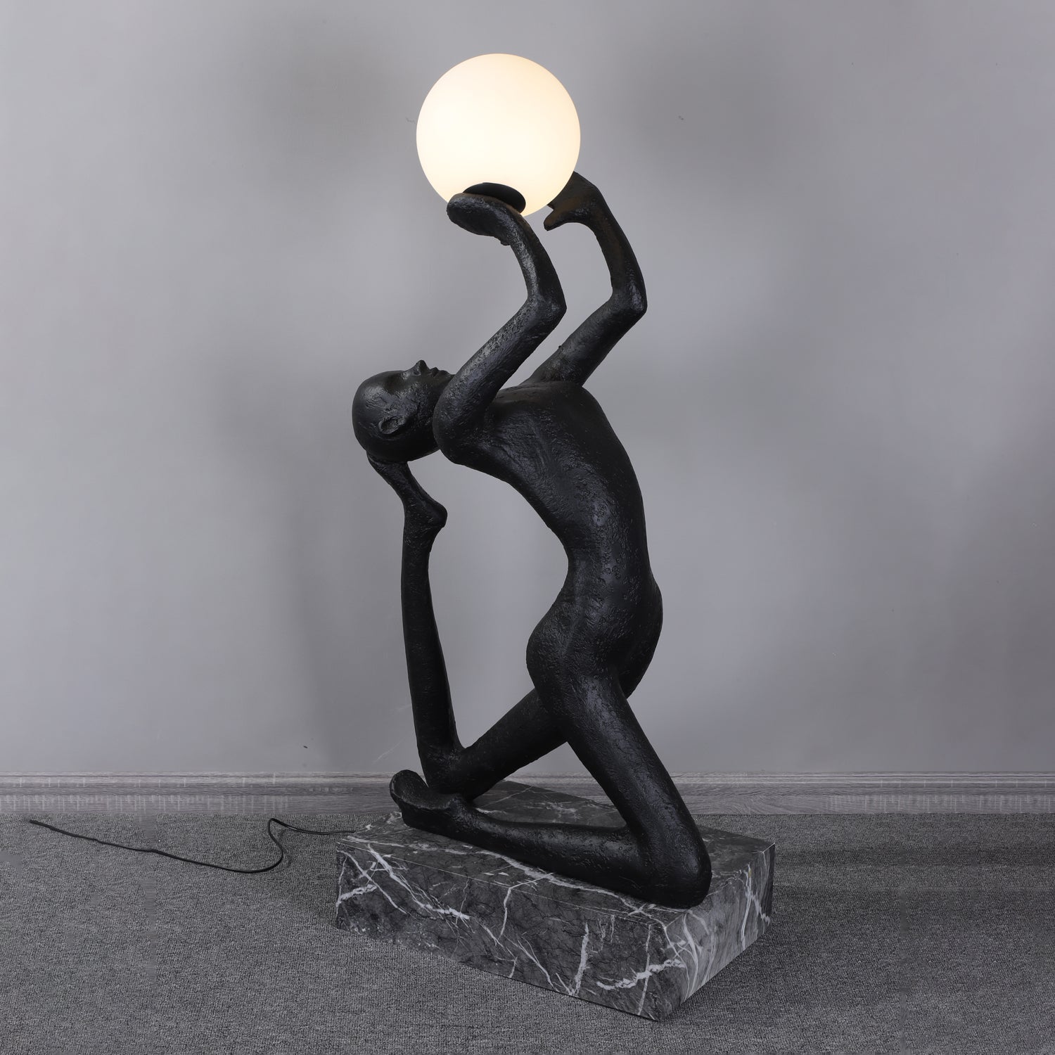 modern-artistic-human-figure-floor-lamp-with-luminous-glass-globe-sphere